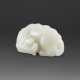 A WHITE JADE CARVING OF A MYTHICAL BEAST - photo 1