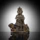 Bronze des Guanyin auf einem Löwen - фото 1