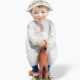 Meissen, Figur "Kind mit Zeitungsmütze, auf einem Holzpferd reitend". - Foto 1