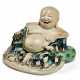 A CHINESE EXPORT PORCELAIN BISCUIT-GLAZED FIGURE OF A LAUGHING BUDDHA - фото 1