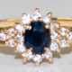 Ring, 585er GG, besetzt mit 1 oval facettiertem Saphir und 19 kl. Brillanten von zus. ca. 0,19 ct., ges. 2,44 g, RG 56 - фото 1