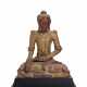 A SOUTH-EAST ASIAN RED-PAINTED AND PARCEL-GILT SEATED FIGURE OF BUDDHA - фото 1