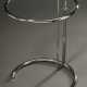 Beistelltisch „E 1027“, Entw.: Eileen Gray 1925, Stahlrohr und Glas, höhenverstellbar (H. 53-91cm), Ø 51cm, Reproduktion, Gebrauchsspuren - photo 1