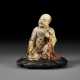 A SOAPSTONE FIGURE OF A SEATED LUOHAN - фото 1