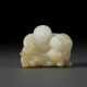 A WHITE JADE CARVING OF A MAN WITH BUDDHIST LION - photo 1