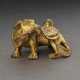 A SMALL GILT-BRONZE FIGURE OF MYTHICAL BEAST - фото 1