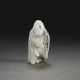 A RARE WHITE AND BLACK JADE FIGURE OF A FOREIGN TRIBUTE BEARER - photo 1