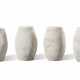 A SET OF FOUR CARVED WHITE MARBLE DRUM STOOLS - photo 1