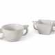 TWO CARVED WHITE STONE TWO-HANDLED CUPS - фото 1
