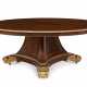 A REGENCY MAHOGANY AND PARCEL-GILT TILT-TOP TRIFORM CENTER TABLE - photo 1