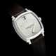 VACHERON CONSTANTIN. A RARE 18K WHITE GOLD LIMITED EDITION CUSHION-SHAPED AUTOMATIC WRISTWATCH WITH JUMP HOUR AND RETROGRADE MINUTES - фото 1