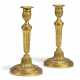 A PAIR OF LOUIS XVI ORMOLU CANDLESTICKS - photo 1