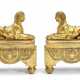 A PAIR OF EMPIRE ORMOLU CHENETS - Foto 1