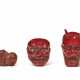 A GROUP OF TWO RED-LACQUER NETSUKE AND A BOXWOOD NETSUKE - photo 1