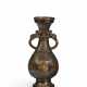 A PARCEL-GILT-LACQUERED BRONZE BALUSTER VASE - photo 1