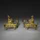 A PAIR OF LOUIS XVI ORMOLU AND BLUED-STEEL CHENETS `AUX CHINOIS` - Foto 1