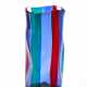 "Fasce verticali" vase model "4317". Produced by Venini, Murano, 1951ca. Transparent red, sapphire, pagliesco and green blown glass. Signed with acid "venini murano Italia". (h 22 cm.; d 10 cm.) (slight defects) | | Literature | Fulvio Bianconi all - Foto 1