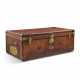 A NATURAL COWHIDE LEATHER TRUNK WITH BRASS HARDWARE - photo 1