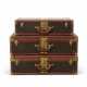 A GROUP OF THREE: A MONOGRAM CANVAS LEATHER BLISTEN 75 & TWO ALZER 75 SUITCASES WITH BRASS HARDWARE - photo 1
