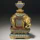 A CLOISONN&#201; AND CHAMPLEV&#201; ENAMEL AND GILT-BRONZE FIGURE OF AN ELEPHANT SUPPORTING A VASE - фото 1