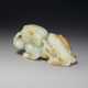 A LARGE AND FINELY CARVED PALE GREENISH-WHITE AND RUSSET JADE `BUDDHIST LION` GROUP - Foto 1