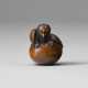 A CARVED WOOD NETSUKE OF TENGU NO TAMAGO - photo 1