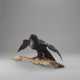 AN IRON ARTICULATED SCULPTURE OF A CROW - photo 1