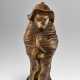 A CARVED WOOD NETSUKE OF A TANUKI - фото 1