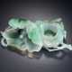 A GREEN AND PALE GREY JADEITE POMEGRANATE AND FLOWER-FORM WASHER - фото 1