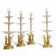 A SET OF FOUR EMPIRE ORMOLU AND GLASS THREE-TIER ETAGERES - photo 1