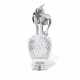 A SMALL SILVER-MOUNTED CUT-GLASS DECANTER - фото 1