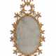 A GEORGE III GILTWOOD OVAL MIRROR - фото 1