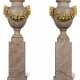 A LARGE PAIR OF FRENCH ORMOLU-MOUNTED GRANITE URNS ON ASSOCIATED PEDESTALS - photo 1