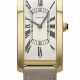 CARTIER. AN EXTREMELY RARE, ELEGANT AND LARGE RECTANGULAR CURVED 18K GOLD WRISTWATCH - photo 1