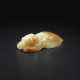 A YELLOW AND RUSSET JADE RECUMBENT HOUND - photo 1