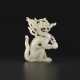 A WHITE JADE OPENWORK FIGURE OF A DRAGON - photo 1