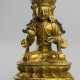 Feuervergoldete Bronze eines Bodhisattva auf einem Lotos - Foto 1