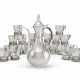 AN OTTOMAN SILVER COFFEE POT AND TWENTY-FIVE SILVER-PLATE MOUNTED GLASS COFFEE CUPS - Foto 1