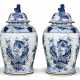 A PAIR OF CHINESE STYLE PORCELAIN BLUE AND WHITE VASES AND COVERS - фото 1