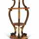 A NORTH EUROPEAN WALNUT, EBONIZED AND PARCEL-GILT ETAGERE - photo 1