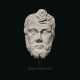 A ROMAN MARBLE HEAD OF A BEARDED BARBARIAN - photo 1