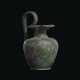 A ROMAN BRONZE TREFOIL OINOCHOE - photo 1