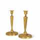 A PAIR OF CONSULAT ORMOLU CANDLESTICKS - photo 1