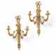 A PAIR OF LOUIS XVI ORMOLU THREE-BRANCH WALL-LIGHTS - Foto 1