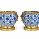 A PAIR OF ORMOLU-MOUNTED CHINESE PORCELAIN BLUE AND WHITE CACHE-POTS - photo 1