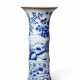 AN UNUSUAL BLUE AND WHITE BEAKER VASE - фото 1