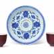 A BLUE AND WHITE CUP STAND - photo 1