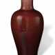 A COPPER-RED-GLAZED BALUSTER VASE - photo 1
