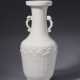 AN UNUSUAL CARVED DEHUA VASE - photo 1