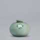 A SLIP-INLAID CELADON STONEWARE OIL BOTTLE - Foto 1